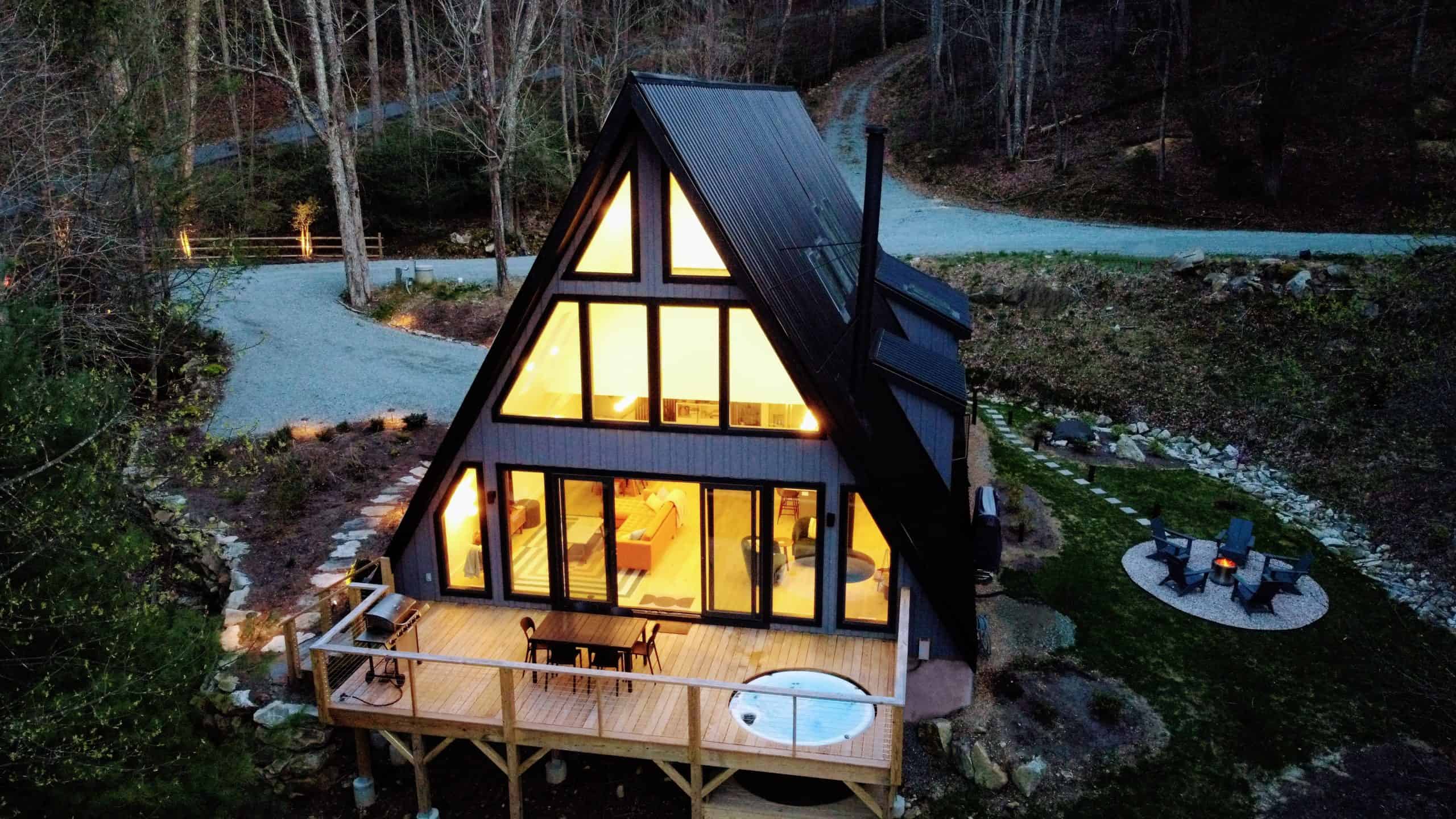 The Creekside modern A-frame exterior at twilight near Boone, North Carolina