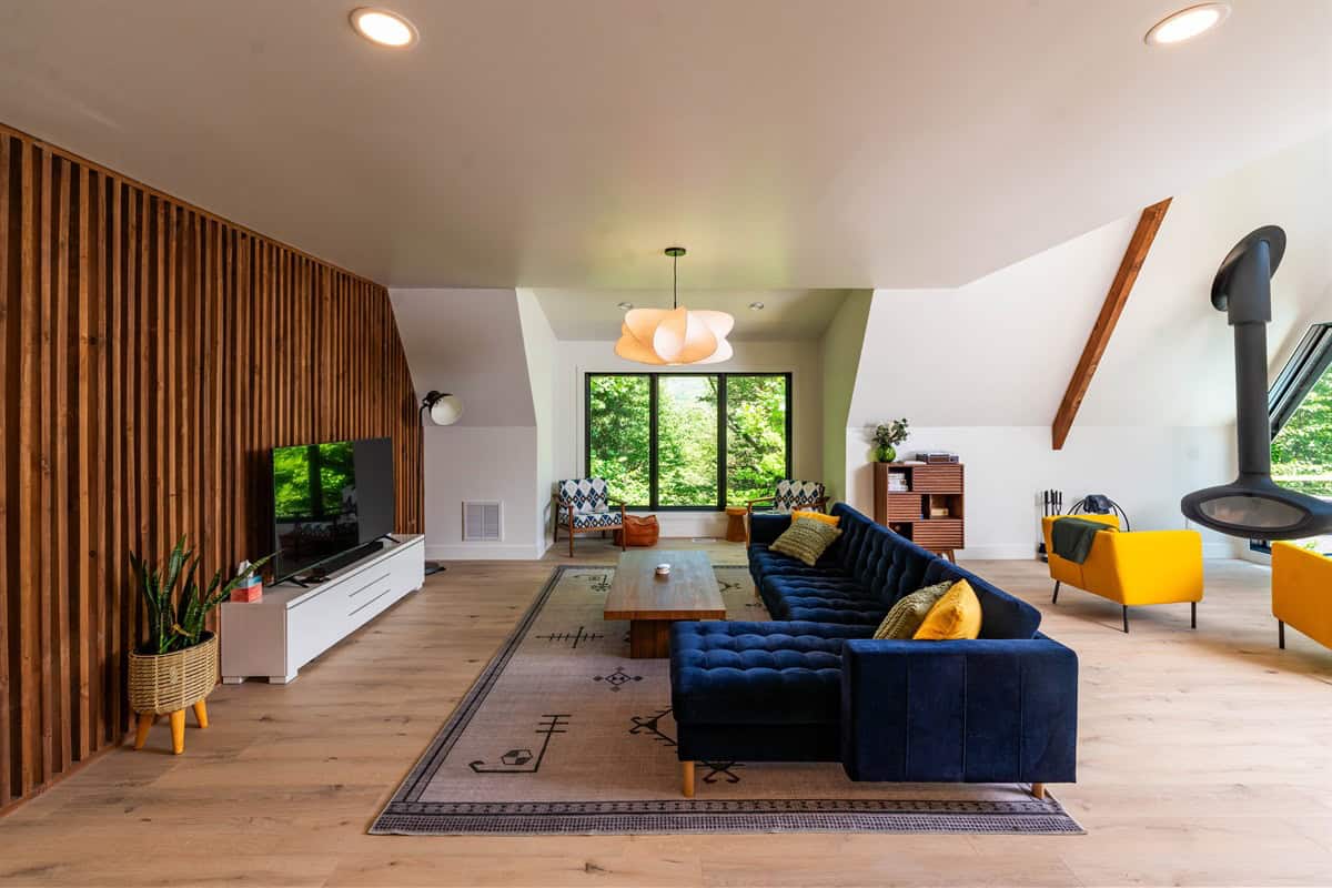 The Grove great room with reading nook and hanging fireplace