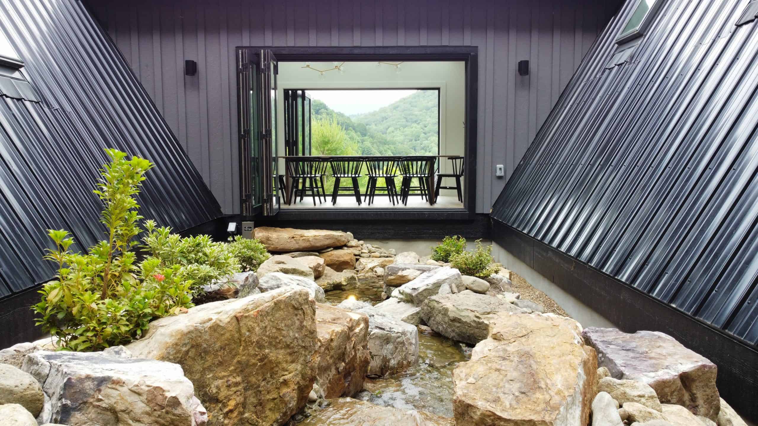 Exterior view of The Overlook dining room and water feature